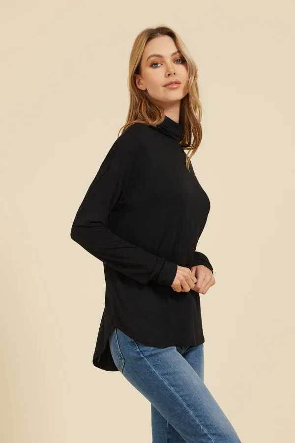 Majestic Soft Touch Semi-Relaxed Long Sleeve Drop Shoulder Turtleneck in Noir