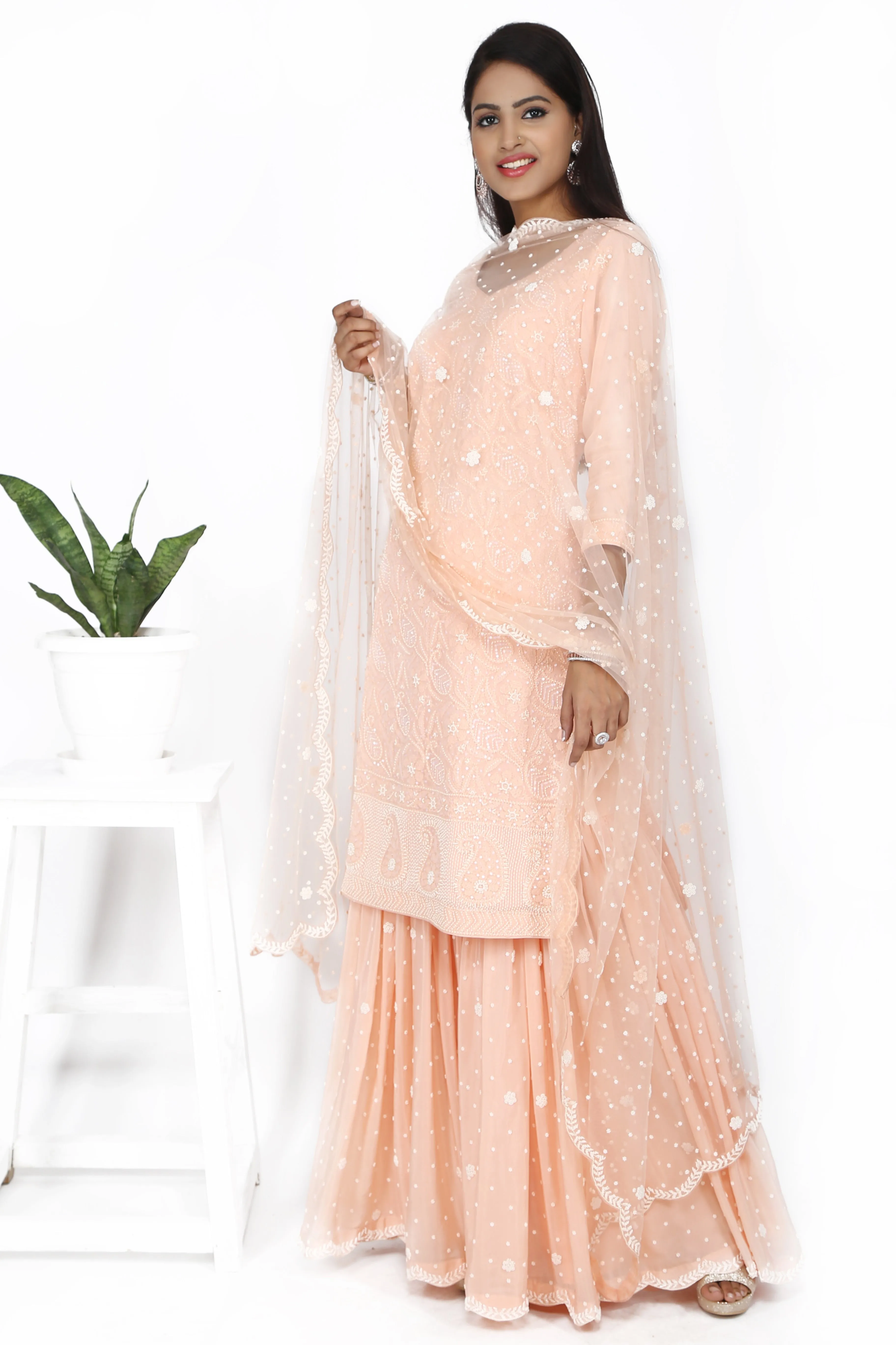 Peach Pink Chikankari Sharara Set.